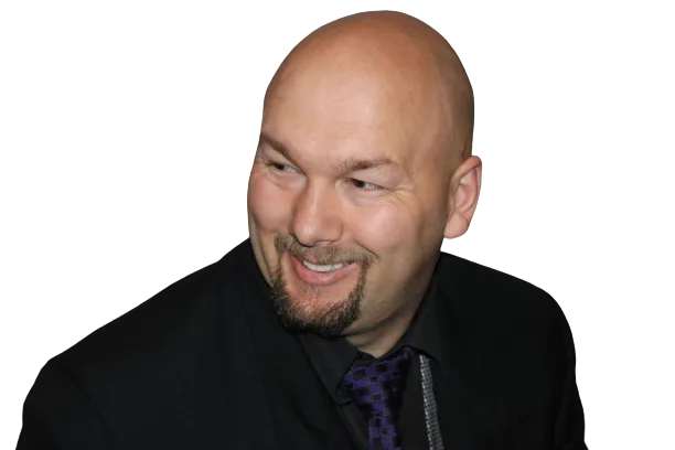 Jesse Lewis smiling in formal attire – Canadian comedy hypnotist headshot