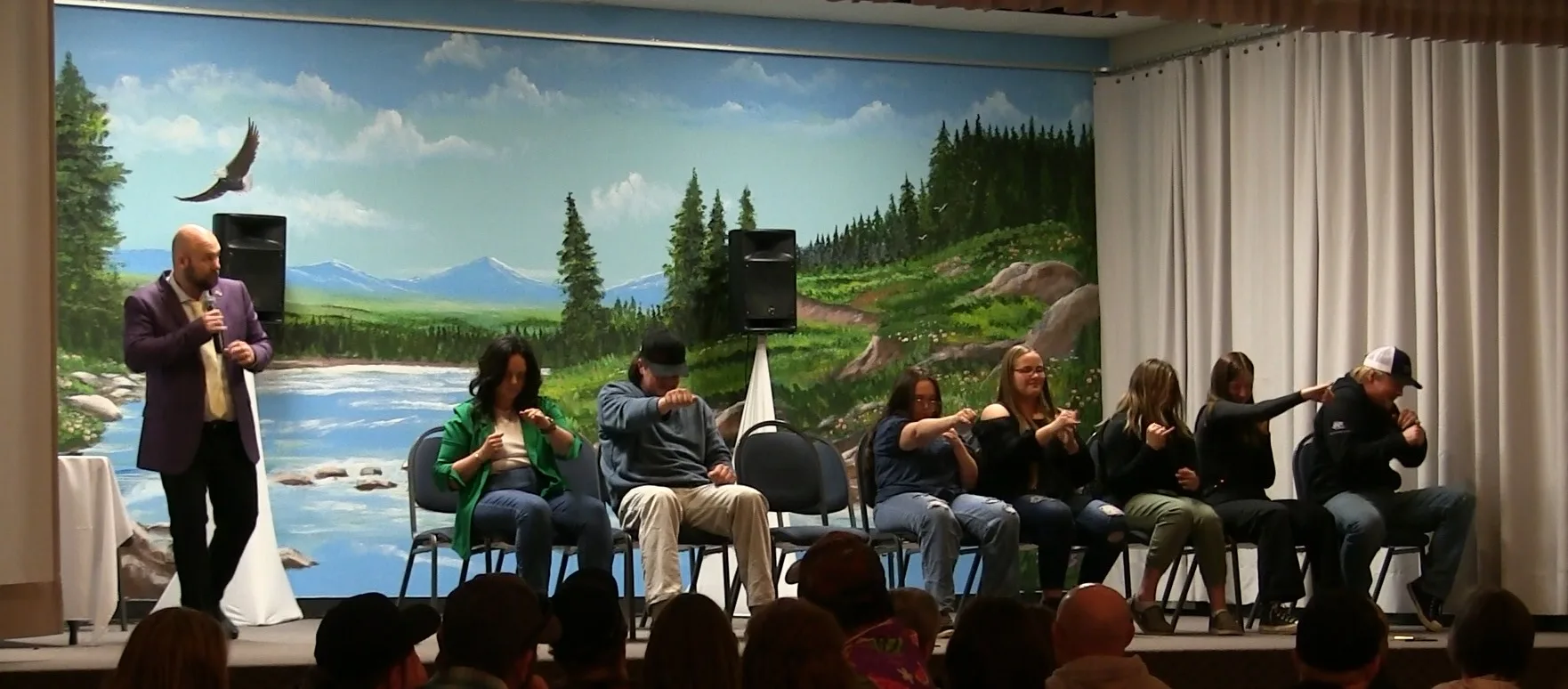 Live stage hypnosis show audience reaction in Baie-Comeau