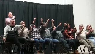 Audience enjoying a stage hypnosis show in Baie-Comeau